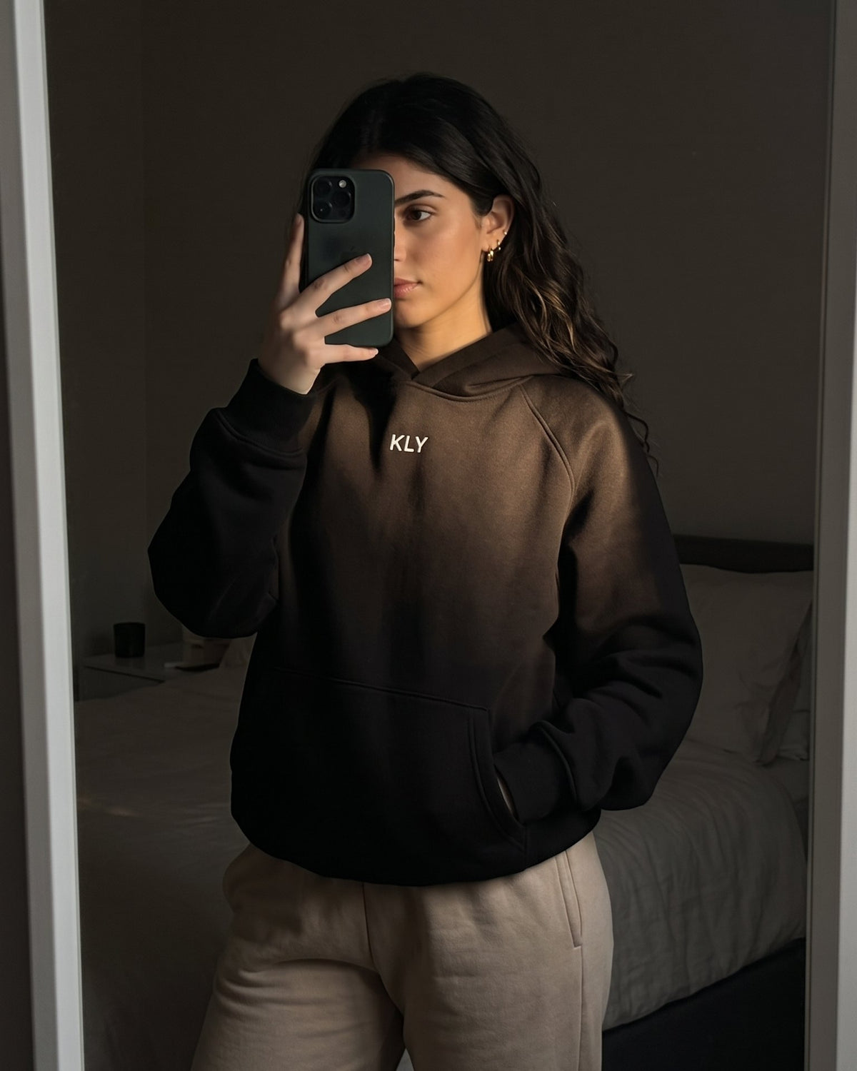 Customer wearing the KLY hoodie