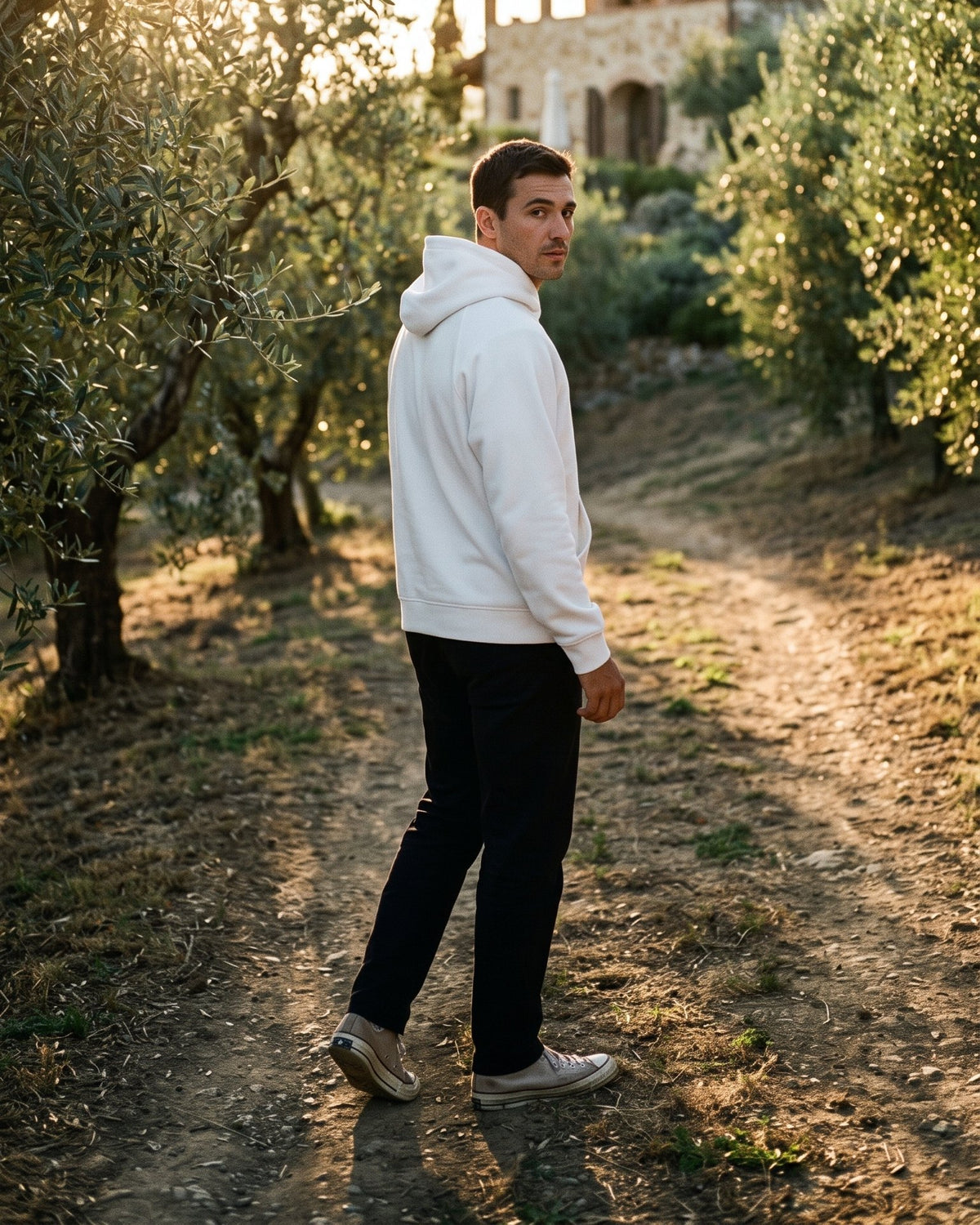 Customer wearing the KLY hoodie in White